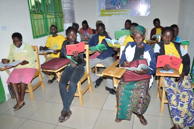 Beneficiaries read the books in community library