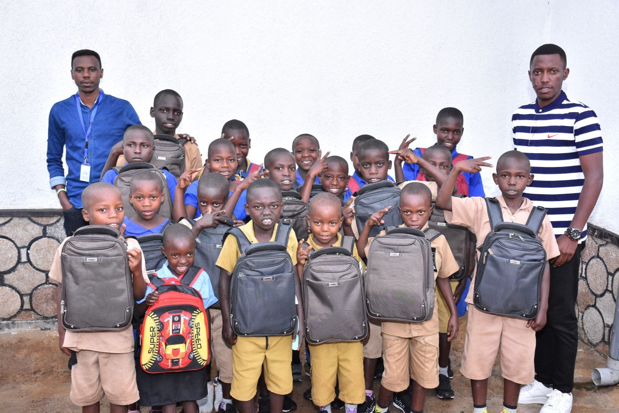 More than 180 children handed a package of school materials this second term