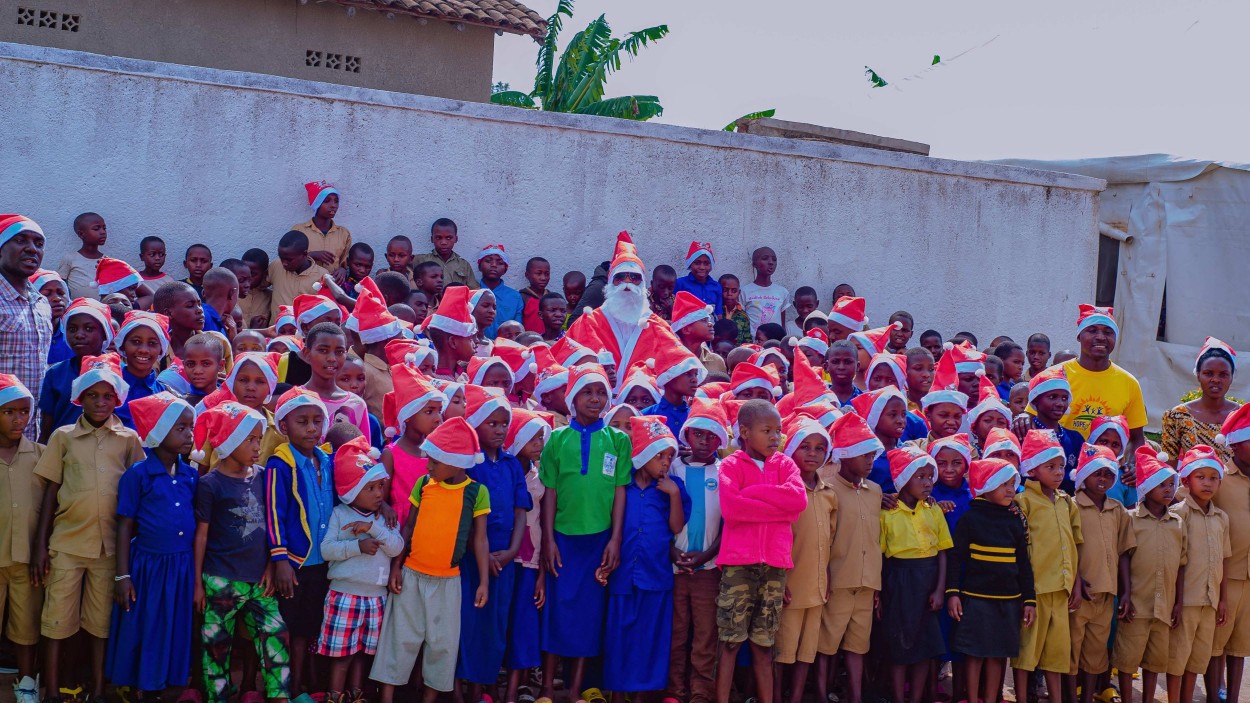 Santa Claus Steals the Show as Hope of Family Spreads Christmas Joy to over 400 Children