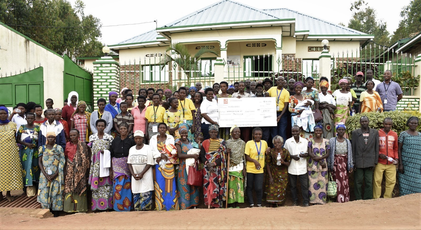 Picture 1: Group picture of beneficiaries, HOF staff and local leaders after receiving the support.
